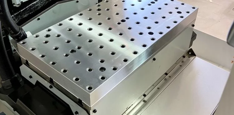 Customized grid plate for machine table